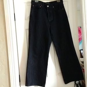 Denim Forum black high waisted flare "Farrah" jeans.